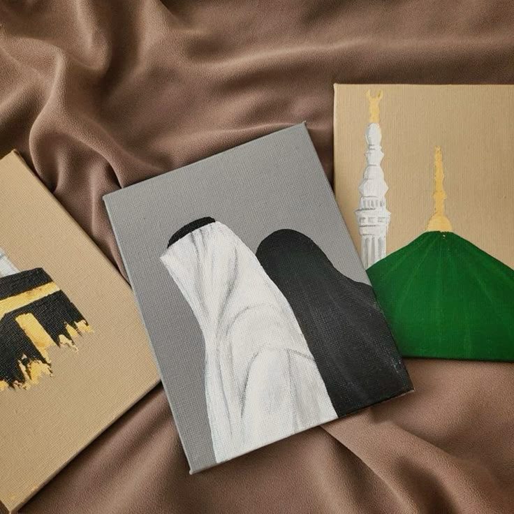 "Islamic-themed custom art canvas paintings showing Kaaba, a faceless couple in traditional attire, and the green dome of Masjid an-Nabawi."